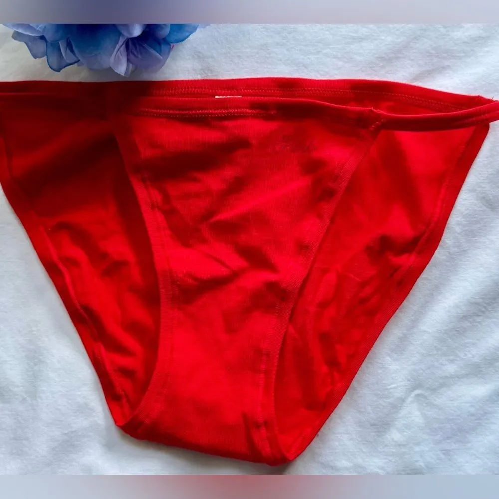 New with tags! Gorgeous red Victoria’s Secret “Cotton String Bikini Panty!”